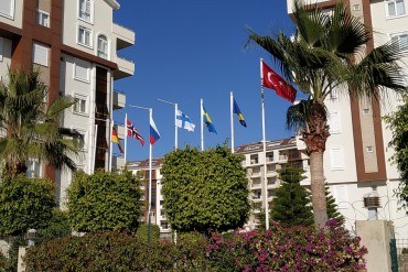 We have replaced the old flags with new ones - this is a symbol of our international unity in Orion City